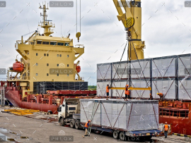 demo-attachment-23-loading-cargo-into-the-ship-in-harbor-PF86726